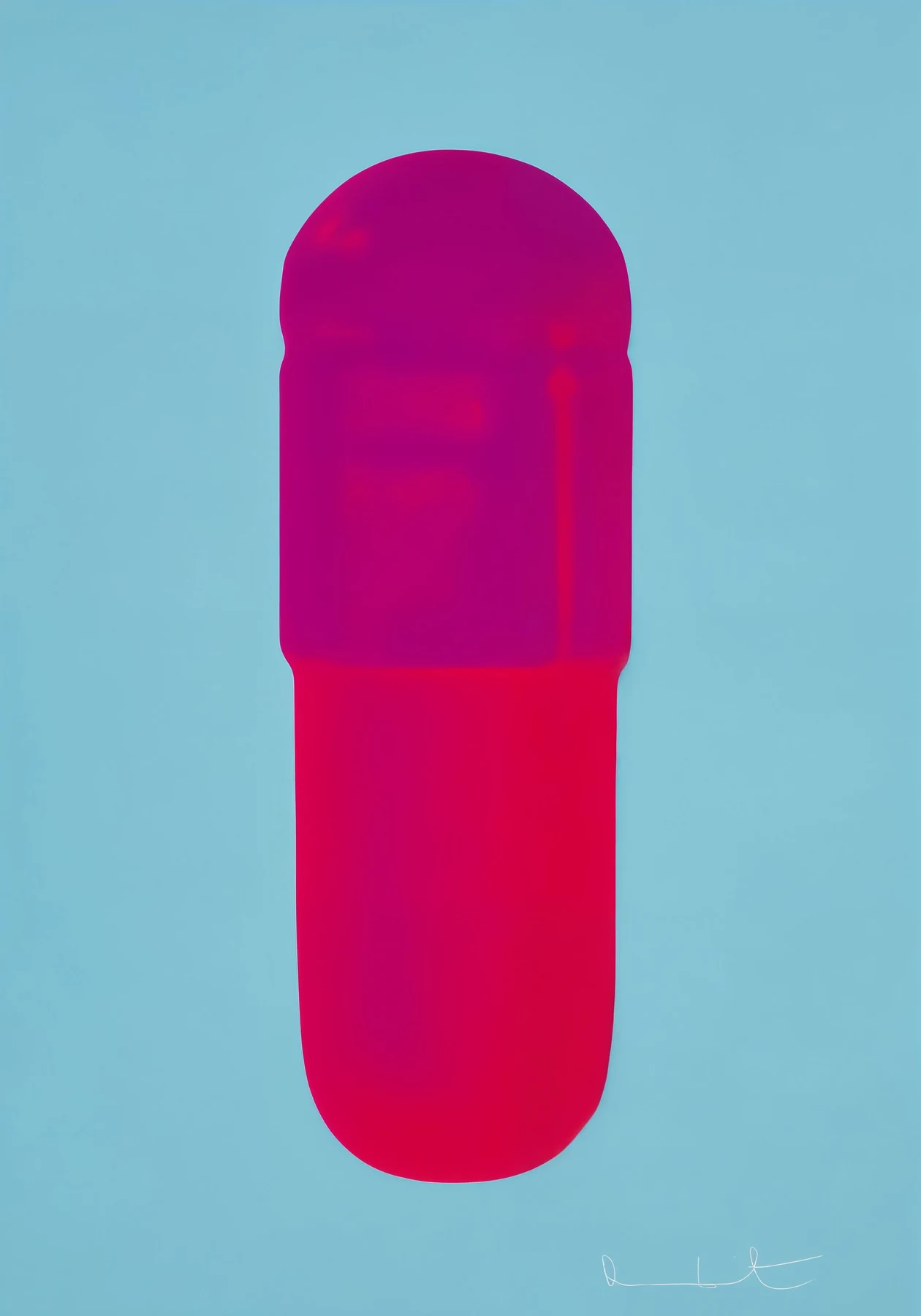 Pink capsule on blue